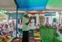 Bupati Bolaang Mongondow Timur Oskar Manoppo, S.E., M.M., saat menyampaikan sambutan dalam Haul ke-20 Habib Abubakar bin Salim dan Maulid Nabi Muhammad SAW di Desa Nuangan, Minggu (4/10/2026). Foto: Istimewa
